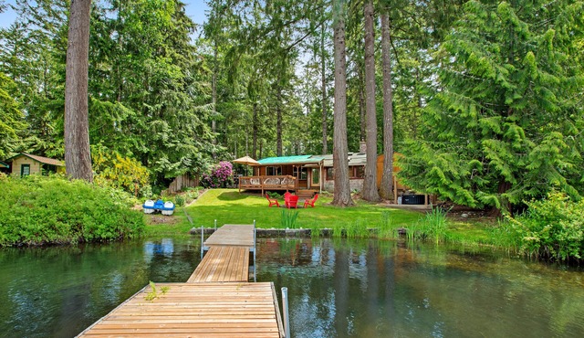 Vintage Mid-Century Modern Lakefront Log Cabin