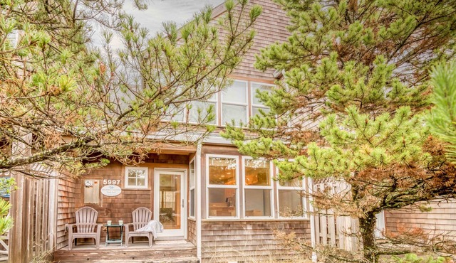 Walk to the Beach from this Family Friendly Home, with a Private Yard and Deck