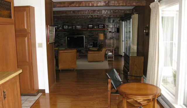 Water front 3-bedroom house in fantastic Bolton Landing with dock and beach.