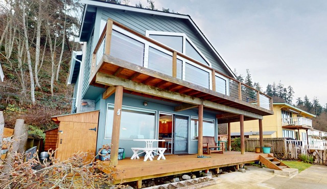 Waterfront home with views, deck and open concept living