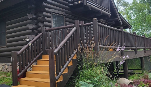 Wilderness Log Home on the River Ely Lakes Fish Hike Ski Snowmobiling ATV Pets