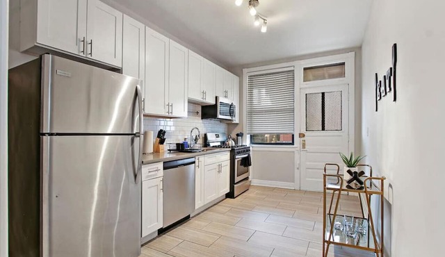 Roomy & Furnished Chicago 3BR w/In-unit Laundry!